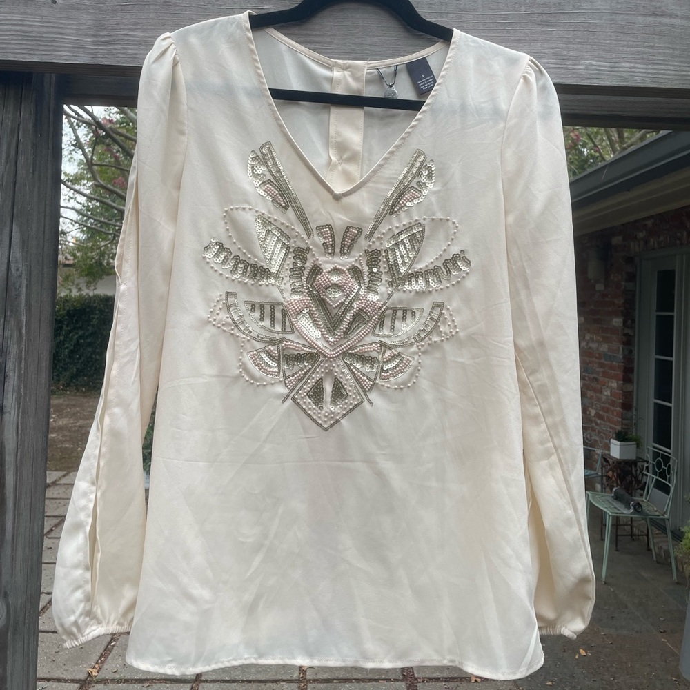 BKE long sleeve blouse, size Small. Gold metallic print, button down back.